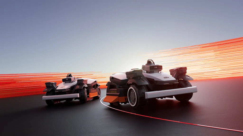 Deux robots tondeuses Mammotion LUBA 4 AWD, le 6000F et le 12000F, sur fond de traînées orange